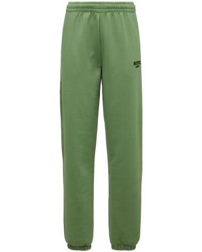 Bavlnené teplákové nohavice Rotate zelená