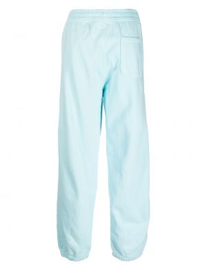 Haftowane spodnie sportowe Stussy niebieskie