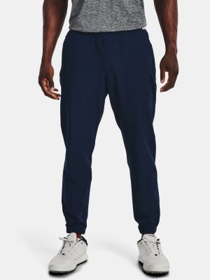 Joggery z kieszeniami Under Armour - niebieski