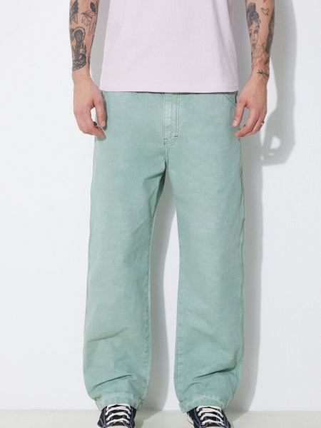 Jednobarevné bavlněné kalhoty Human Made zelené