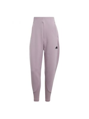 Priliehavé teplákové nohavice Adidas fialová