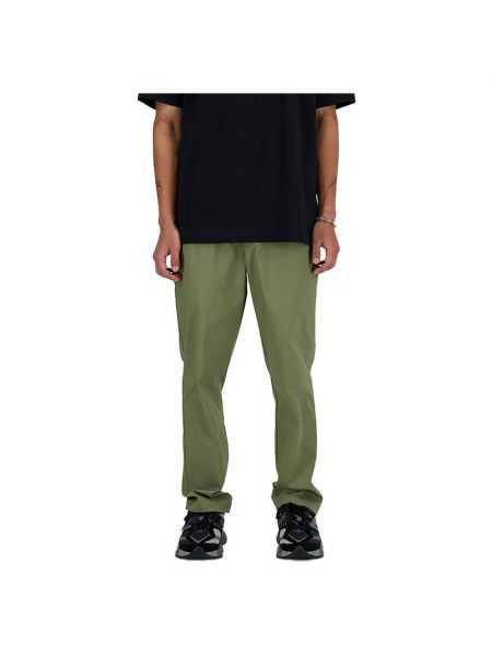 Прямые брюки New Balance зеленые