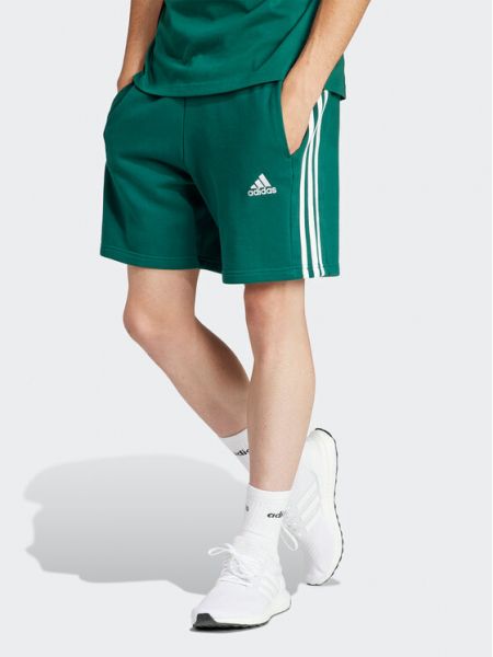 Pruhované priliehavé športové šortky Adidas zelená