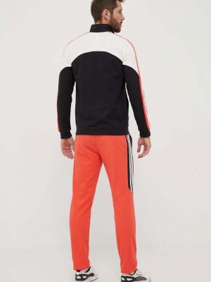 Оранжевый костюм Adidas