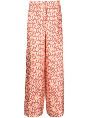 Pantaloni con stampa Versace rosa