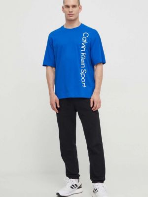 Koszulka bawełniana z nadrukiem Calvin Klein Performance niebieska