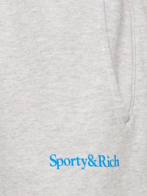 Teplákové nohavice Sporty & Rich sivá