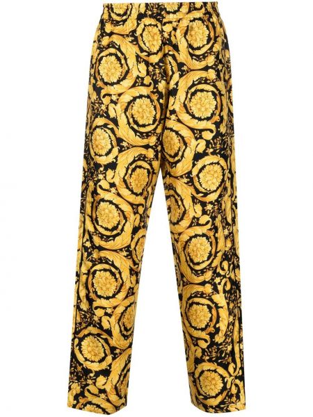 Pantaloni con stampa Versace giallo