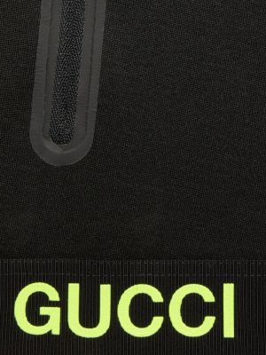 Jaka ar kapuci ar apdruku Gucci melns