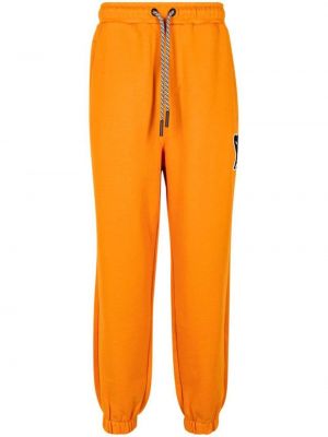 Спортни панталони Puma оранжево