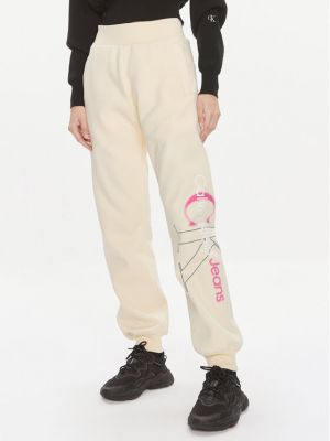 Pantaloni sport cu croială lejeră Calvin Klein Jeans galben
