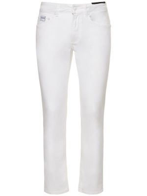 Jeansy skinny bawełniane Versace Jeans Couture białe