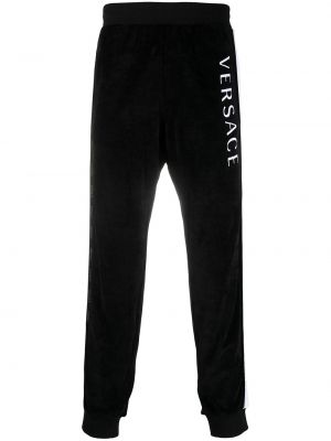 Pantaloni con stampa Versace nero