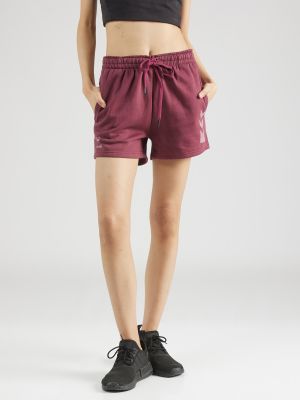 Teplákové nohavice Hummel fialová