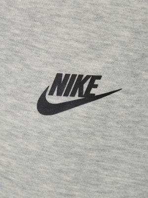 Fleecové běžecké kalhoty Nike šedé