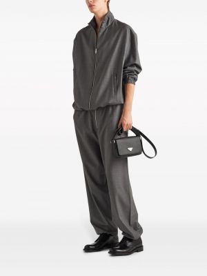 Vlněné kalhoty relaxed fit Prada šedé