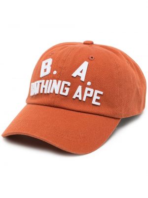 Памучна шапка с козирки с принт A Bathing Ape® оранжево