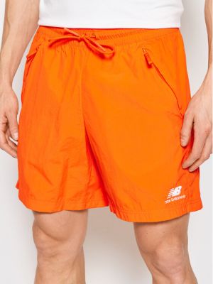 Спортни шорти New Balance оранжево