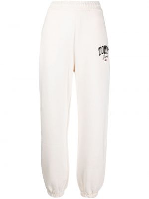 Spodnie sportowe bawełniane z nadrukiem Tommy Jeans białe