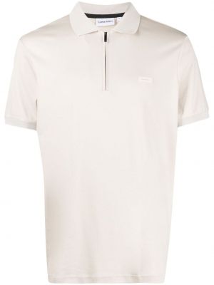 Polo krekls ar rāvējslēdzēju Calvin Klein bēšs