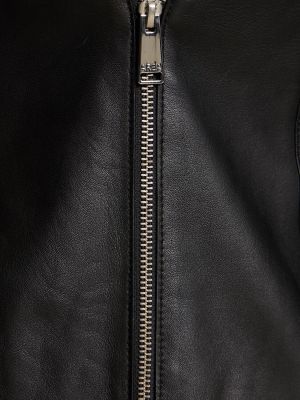 Punktotas dabīgās ādas mini kleita ar radzēm Area melns
