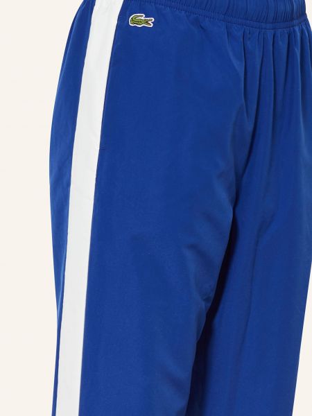 Sportovní kalhoty Lacoste modré