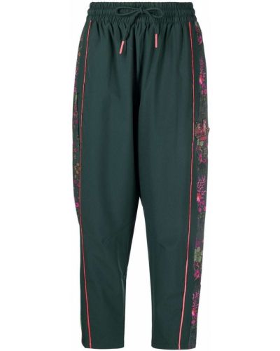 Спортни панталони на цветя с принт Puma зелено