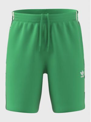 Pruhované priliehavé športové šortky Adidas zelená
