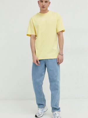 Памучна тениска с дълъг ръкав с апликация Karl Kani жълто
