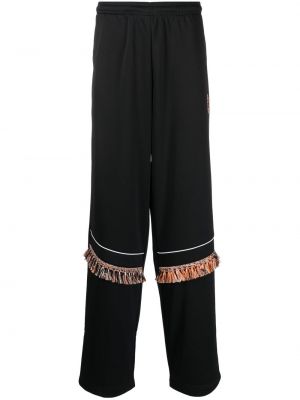 Sportovní kalhoty s třásněmi Marcelo Burlon County Of Milan černé