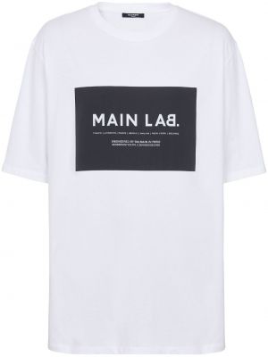 T-shirt avec imprimé slogan en coton à imprimé Balmain blanc