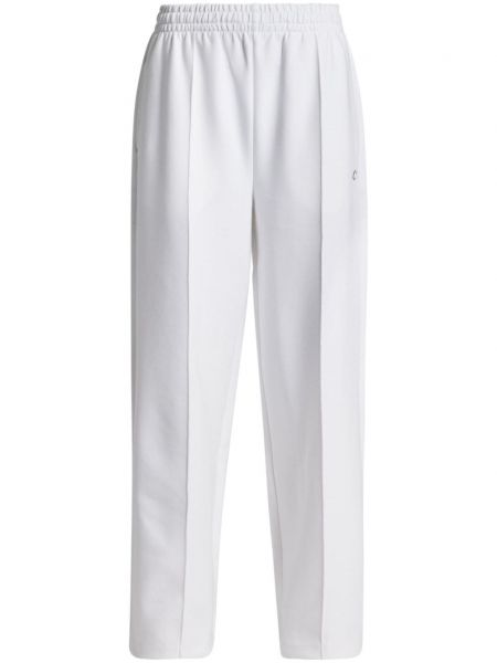 Voľné teplákové nohavice Lacoste biela
