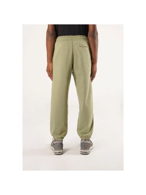 Pantalones de chándal New Balance verde