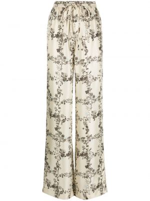 Pantaloni de mătase cu model floral cu croială lejeră Nanushka alb
