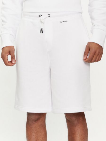 Priliehavé športové šortky Calvin Klein biela