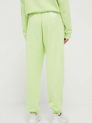 Bavlněné kalhoty Adidas zelené