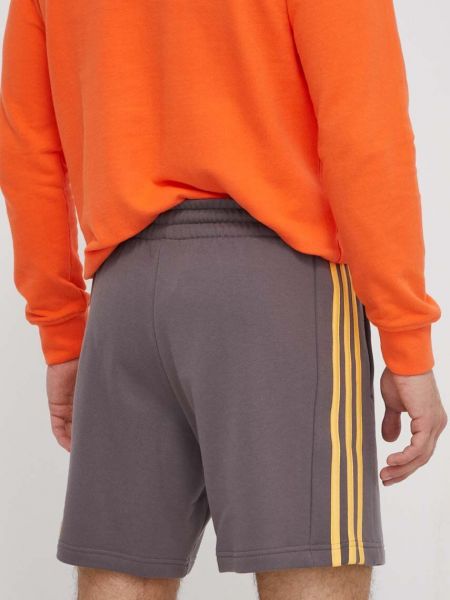 Pantaloni sport din bumbac cu dungi Adidas