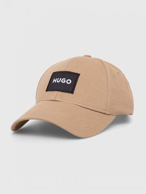 Памучна шапка с козирки с апликация Hugo бежово