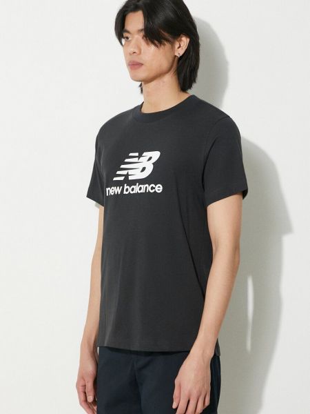Bombažna majica v športnem stilu New Balance črna
