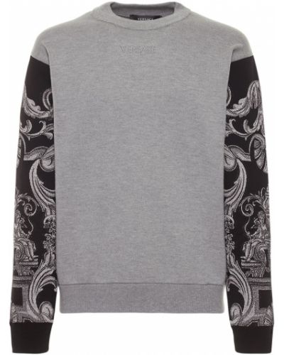Памучен пуловер Versace сиво
