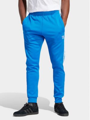 Slim fit sportovní kalhoty Adidas modré