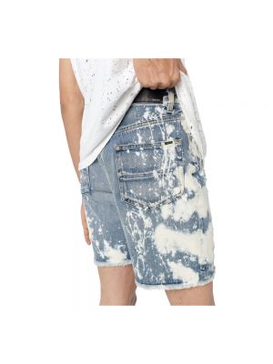 Pantalones cortos vaqueros desgastados de algodón Amiri azul