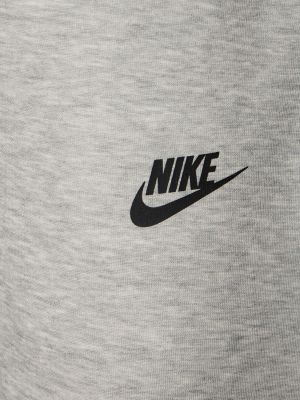 Slim fit fleecové sportovní kalhoty Nike šedé