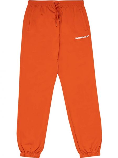 Teplákové nohavice s výšivkou Stadium Goods® oranžová
