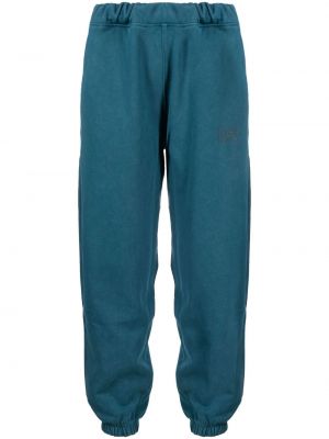 Džerzej bavlnené teplákové nohavice s potlačou Over Over modrá
