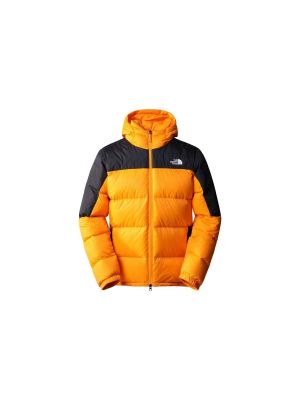 Péřový kabát The North Face žlutý