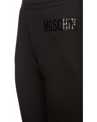 Памучни спортни панталони от джърси Moschino черно