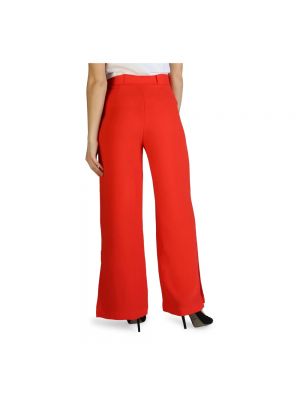 Spodnie relaxed fit w jednolitym kolorze Armani Exchange czerwone
