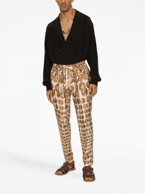 Hedvábné kalhoty s potiskem Dolce & Gabbana zlaté
