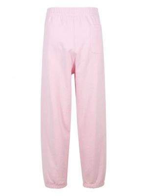 Satynowe spodnie sportowe Supreme różowe